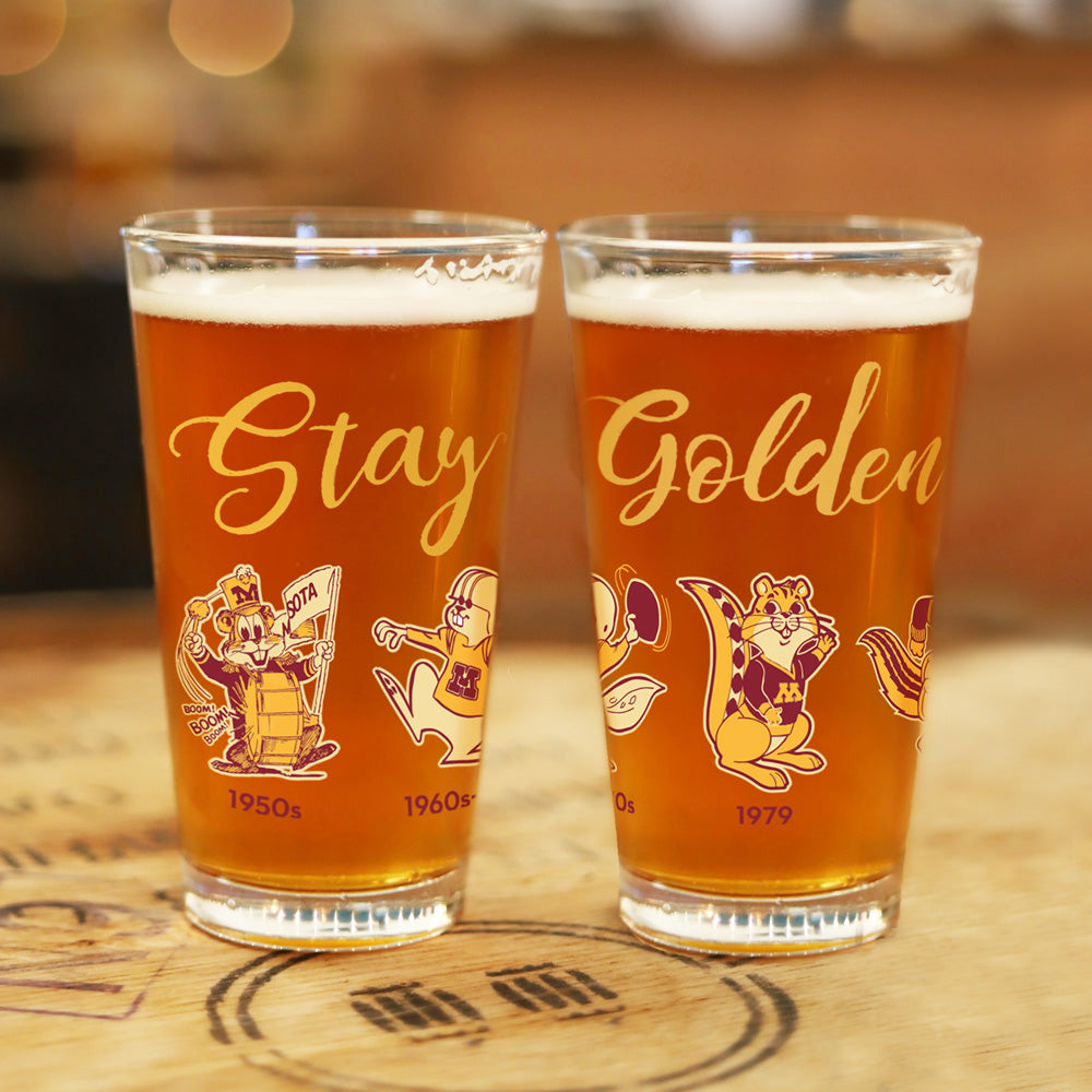 The Evolution of Goldy Pint Glass Set of 4 MN Alumni Market